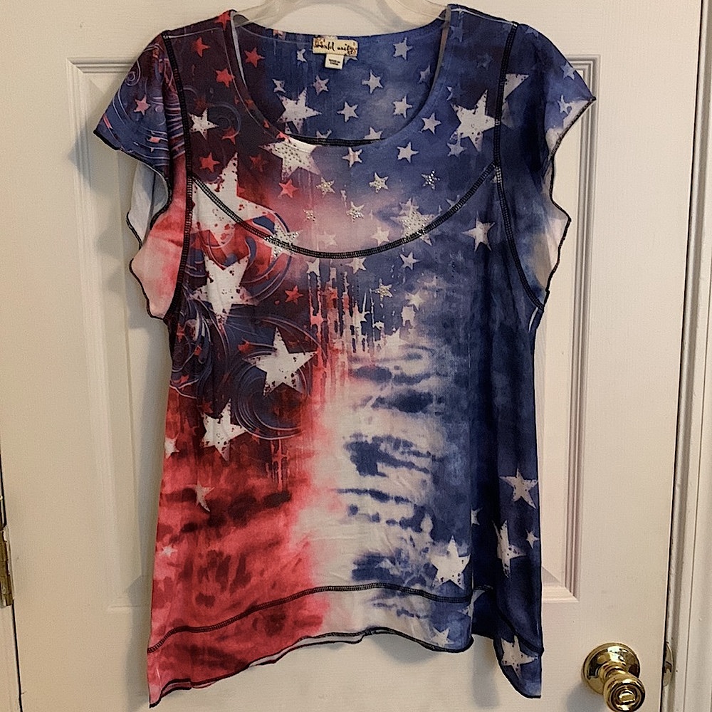 Red, white & blue embellished top; stars motif. Flutter sleeves, sharkbite hem.